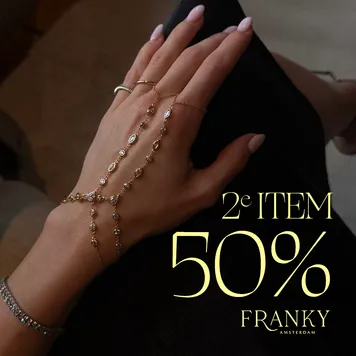 Moody gold jewelry ad with a 2nd item 50% offer in thin serif type