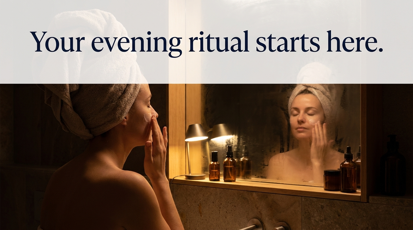 Dark bathroom scene with a pale wash band across the top carrying the navy serif headline 'Your evening ritual starts here.'