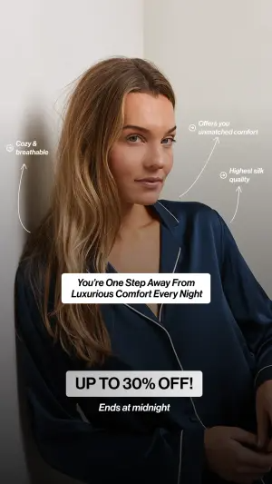 lifestyle ad of a woman in a navy silk pyjama shirt with three hand-drawn arrows pointing to fabric qualities and a discount line